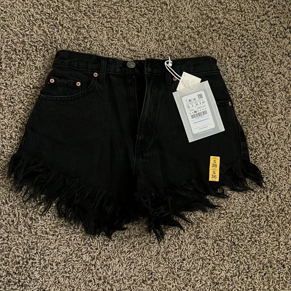 Black denim shorts